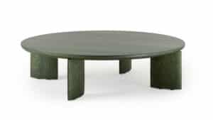 Runder Couchtisch aus grün lackiertem Holz mit glatter Oberfläche und vier breiten, rechteckigen Beinen – modernes Design mit kräftiger Farbwirkung für stilvolle Wohnräume.